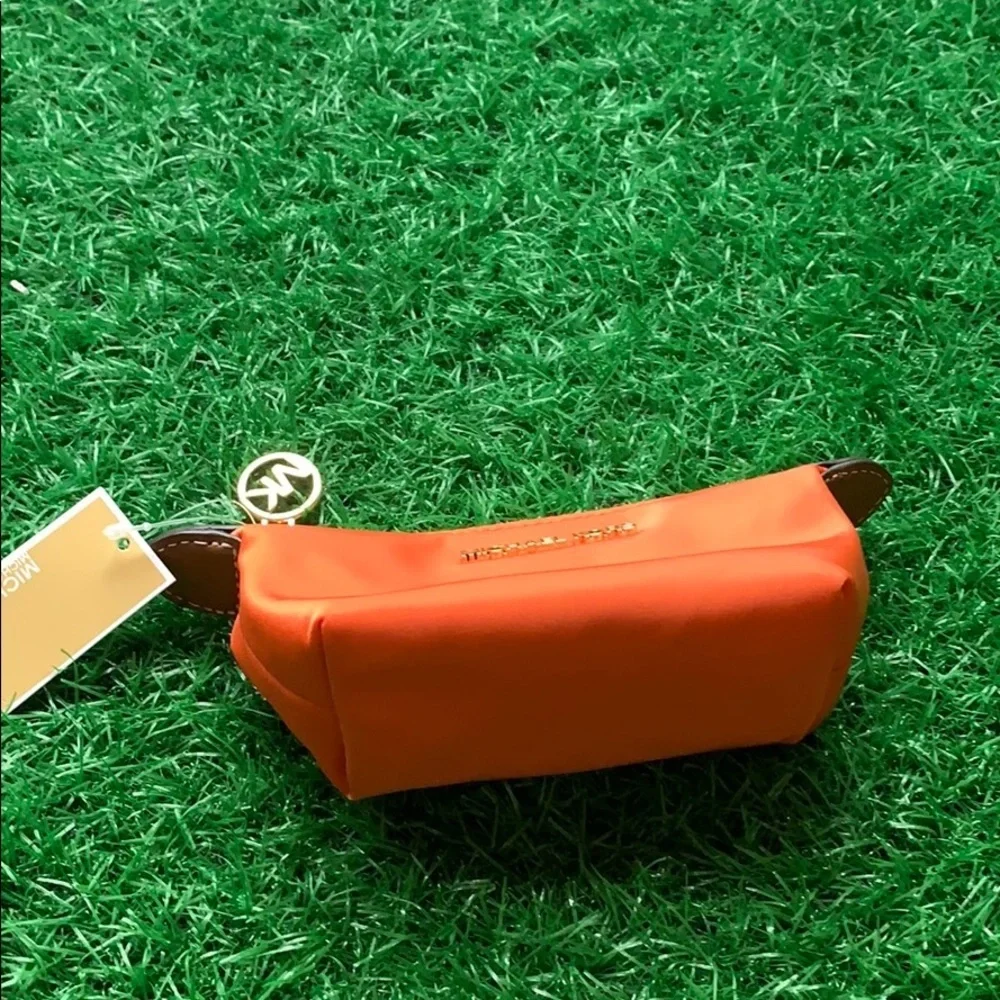MICHAEL KORS TRAVEL XS POUCH TANGERINE - Picture 12 of 16